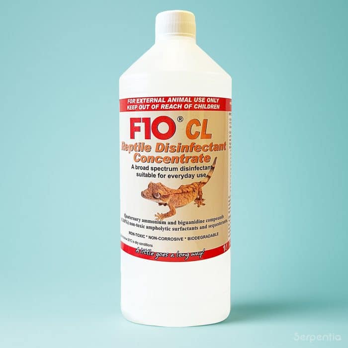 F10 CL Reptile Disinfectant 1 Litre bottle on light blue gradient background