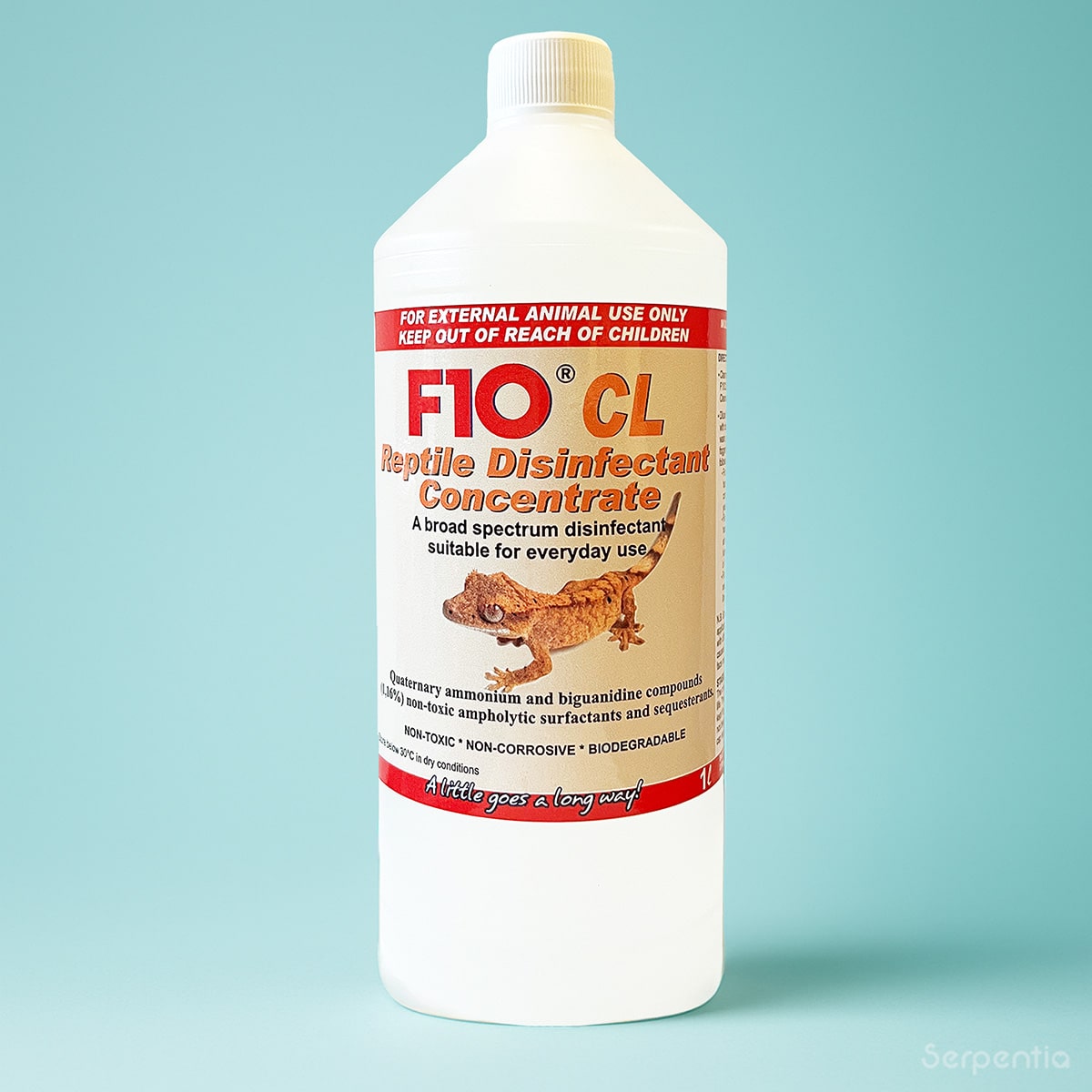 F10 CL Reptile Disinfectant 1 Litre bottle on light blue gradient background