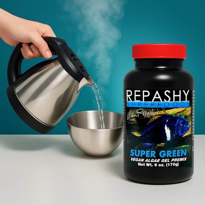 Repashy Super Green 170g fish food preparation image showing hot water being poured into a bowl with the product jar beside it.