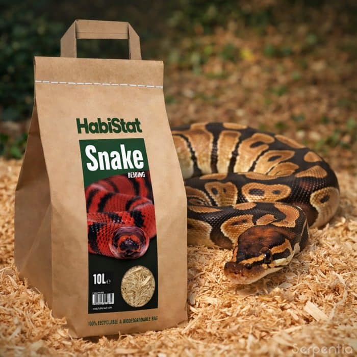 HabiStat Snake Bedding 10L wood substrate shown with ball python in dry enclosure