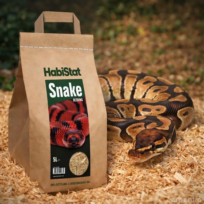 HabiStat Snake Bedding 5L wood substrate shown with ball python in dry enclosure