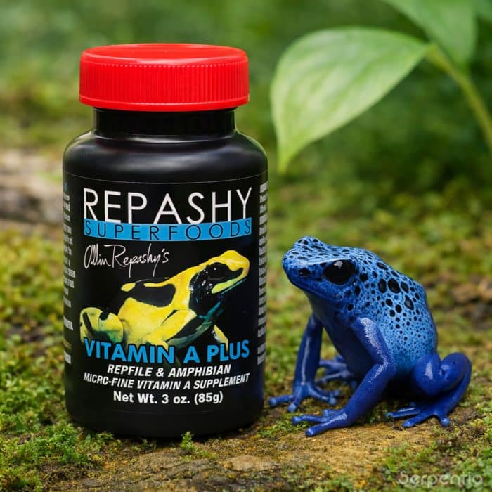 Repashy Vitamin A Plus 85g reptile and amphibian vitamin supplement shown beside a blue poison dart frog.