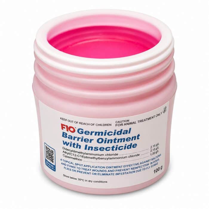 F10 Germicidal Barrier Ointment with Insecticide 100g for animal wound care and fly strike open jar showing pink coloured ointment