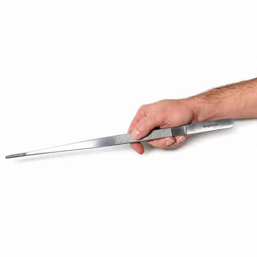 Serpentia 40cm Long Stainless Steel reptile feeding tweezer shown in hand for size