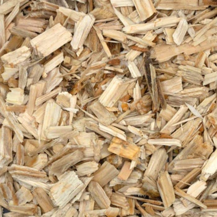 Close-up of HabiStat Elements Beech Chip reptile substrate showing the natural wood chip texture